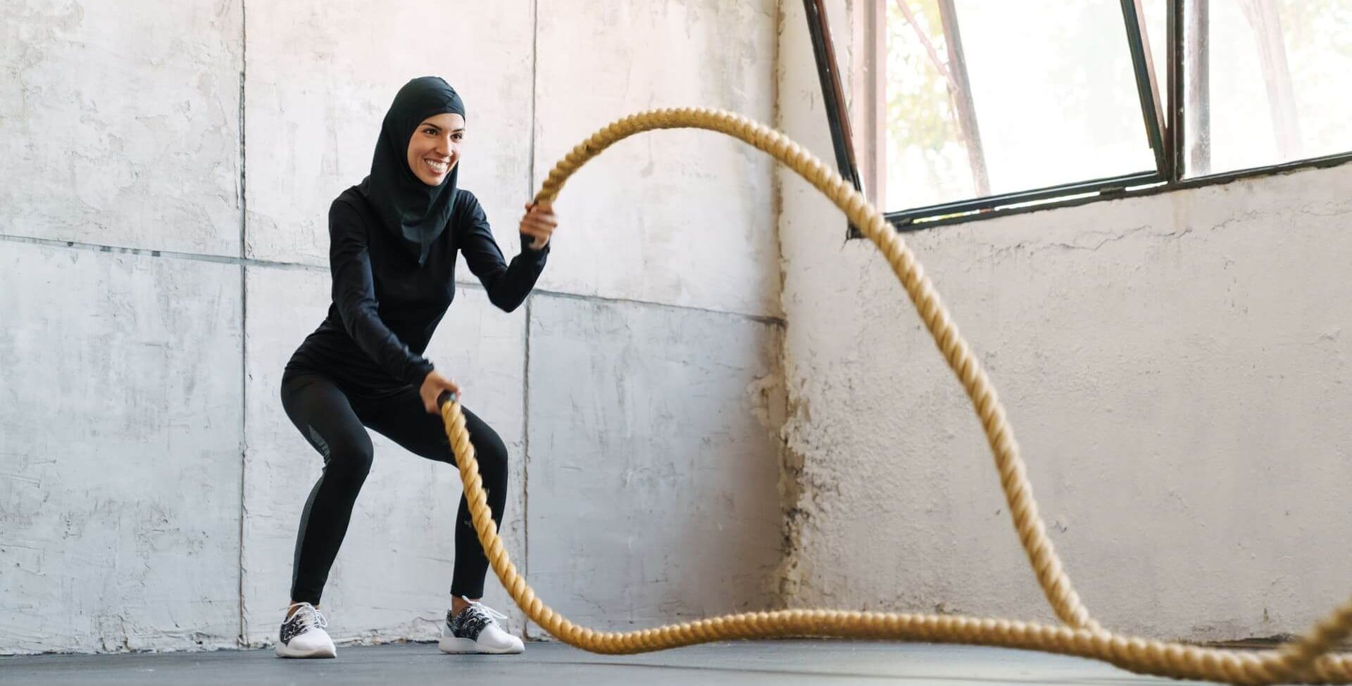 young muslim woman in hijab working out with battl 2021 09 03 17 18 55 utc